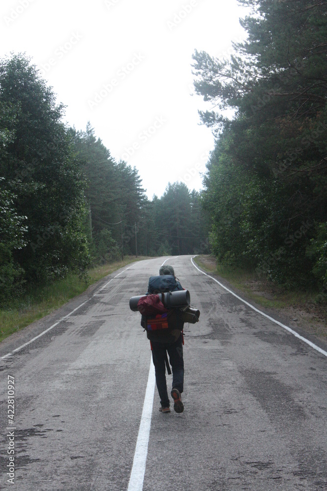 Naklejka premium tourist on the road