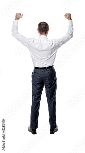 businessman with arms raised in victory.