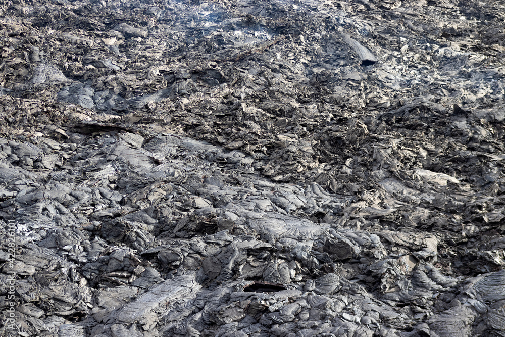 Texture of volcanic lava. Volcano eruption at Fagradalsfjall, Iceland. Texture of volcanic lava. Volcano eruption at Fagradalsfjall, Iceland.