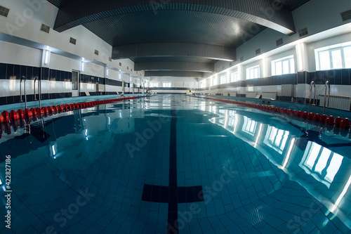 swimming pool for swimming in the gym. clean and cold water in the indoor pool