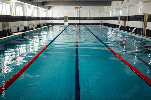lane divider in the pool. swimming pool with clean water for athletes training
