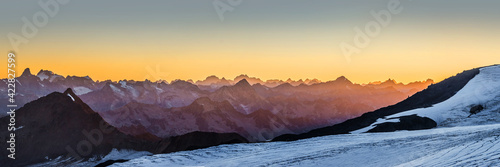 Fototapeta Naklejka Na Ścianę i Meble -  Caucasus mountains near Mt. Elbrus after sunset. Panoramic view from 