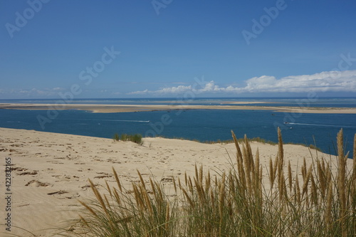 Spectacular view of the Arcachon Bay from the top of sandy Dune du Pilat on a beautiful sunny afternoon