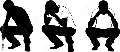 silhouettes of crouching sad men