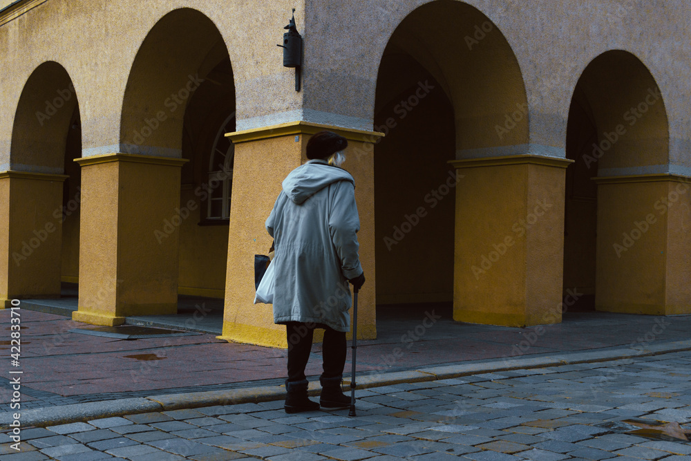 elder woman in the town square
