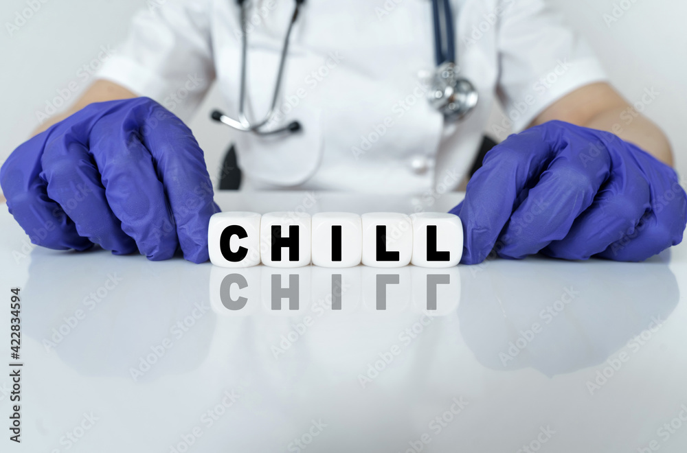 The doctor put together a word from cubes CHILL The doctor put together a word from cubes CHILL