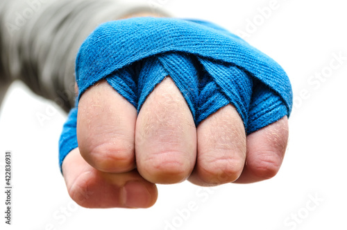 An athlete's fist, a boxer bandaged with an elastic bandage