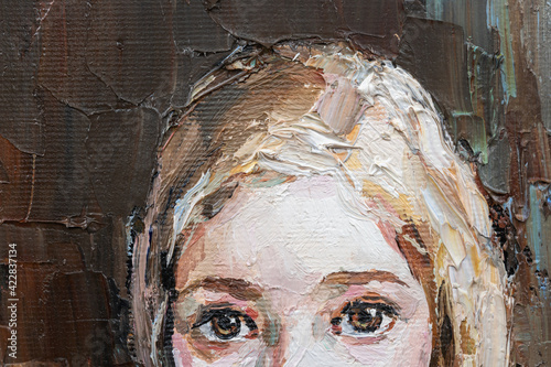 .Cute beautiful girl holding her hair. Fragment of oil painting on canvas. .Portrait of a child with brown eyes and blond hair.