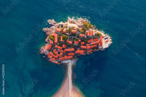 Sveti Stefan, Montenegro. Aerial above view of the Sveti Stefan island. Drone footage. Famous travel destination. photo