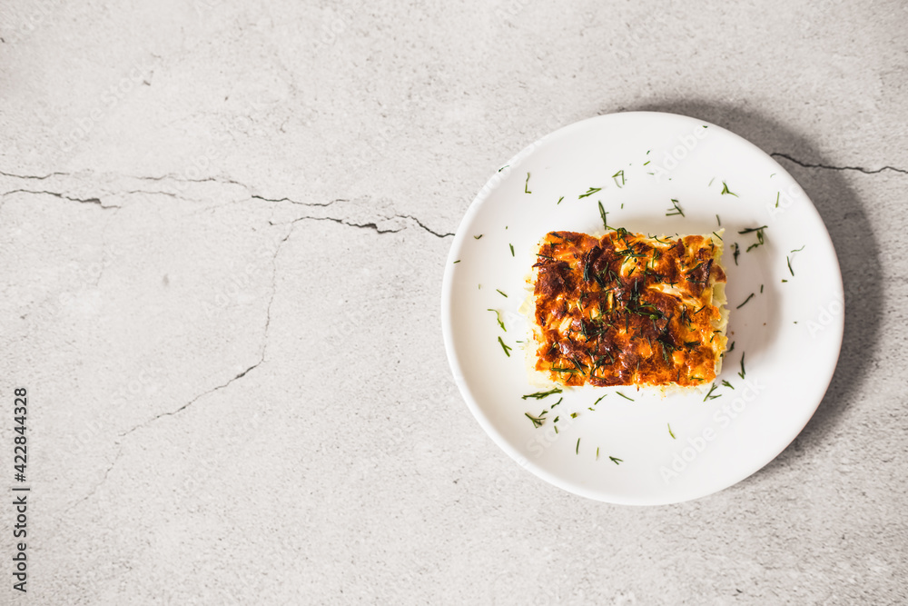 cabbage pie on a grey table. Flat lay top-down cabbage pie on a grey table. Flat lay top-down