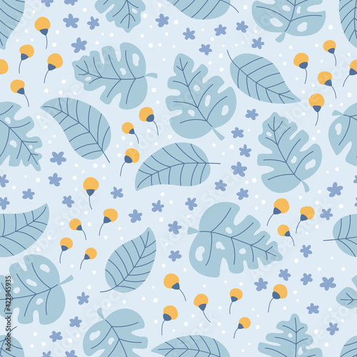 Floral seamless pattern on blue background. Hand drawn doodle monstera and tropical leaves. Small yellow and blue flowers field. Vector illustration.