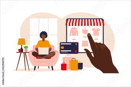 African woman shopping online on laptop. Vector illustration. Online store payment. Bank credit cards. Digital pay technology. E-paying. Flat style modern vector illustration.