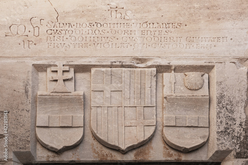 Knight Symbols and details of an ancient Roman marble sculpture in Castle of St. Peter or Bodrum Castle, Turkey.