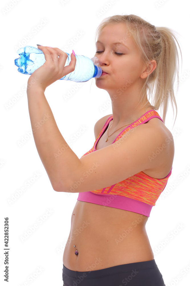 During intense exercise, the girl spends time drinking an energy drink During intense exercise, the girl spends time drinking an energy drink
