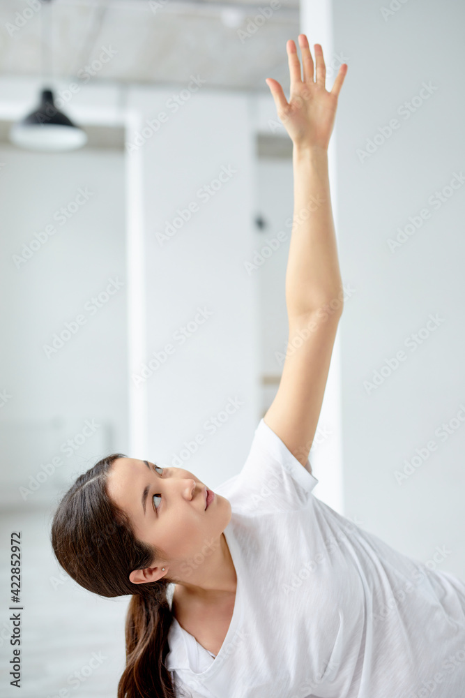 Beautiful Pregnant Woman Doing Yoga In Studio, Raising Hands Beautiful Pregnant Woman Doing Yoga In Studio, Raising Hands