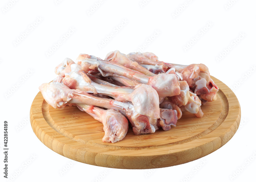  raw chicken bones on white background