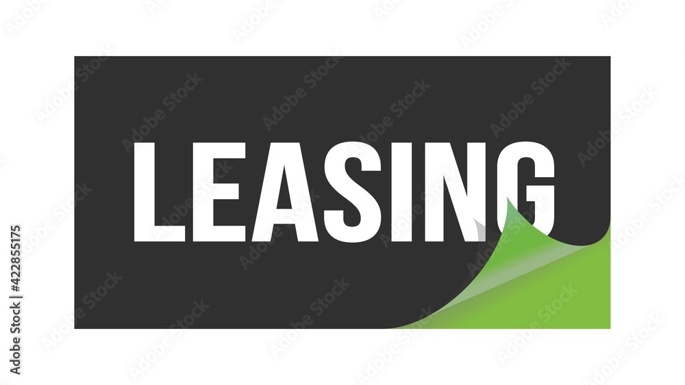 LEASING text written on black green sticker. LEASING text written on black green sticker.