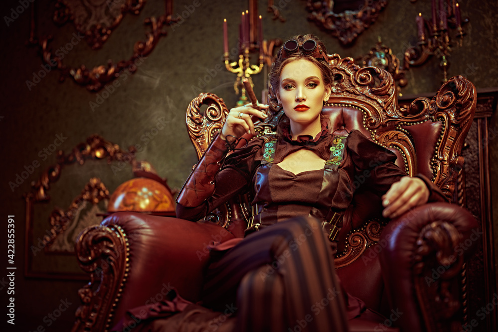 woman sits holding cigar