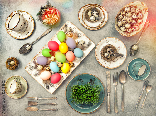 Easter flat lay with colored eggs decoration Vintage toned