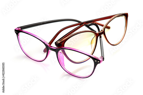 Glasses for vision, in a plastic frame, with transparent optics, two pieces, on a white background