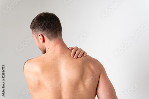 The muscles of the neck in a man on a white background are hurt pain sore muscle, ill sick isolated massage stress, human chronic. Hold red disease suffer attractive