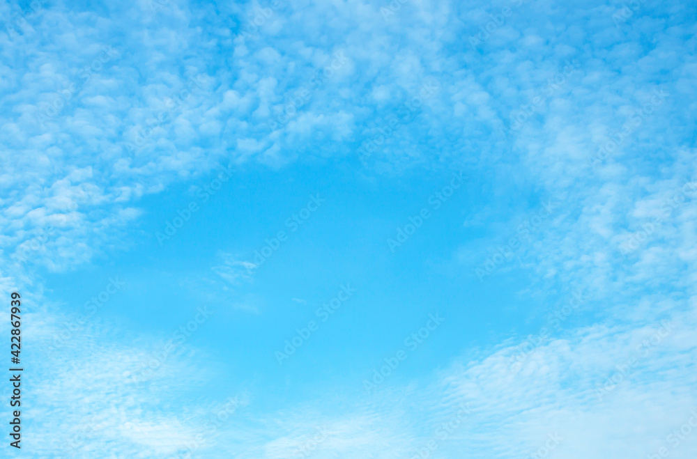 The sky is large, bright, beautiful and has white clouds. The sky is large, bright, beautiful and has white clouds.