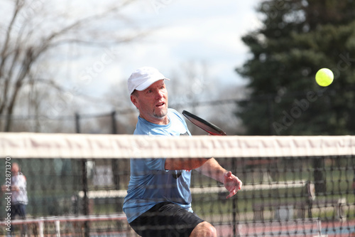 A pickleball dink during outside play
