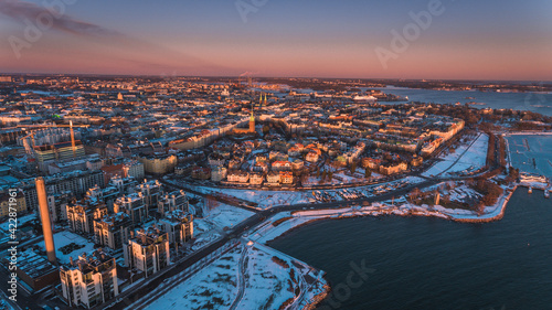 Aerial shot of Helsinki in deep mid-winter sunset.