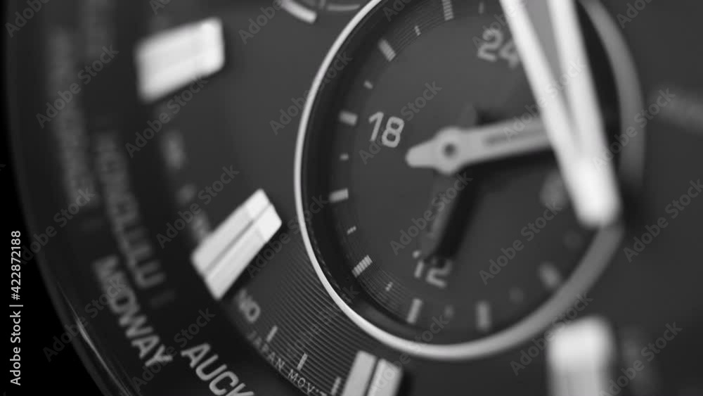 black, modern, chronograph wristwatch close-up black, modern, chronograph wristwatch close-up