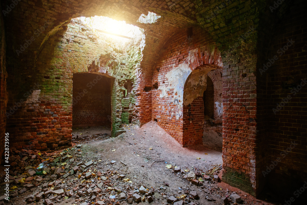 Dark old ancient abandoned red brick ruined historical building