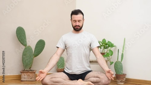 man meditating in comfort zone at home 