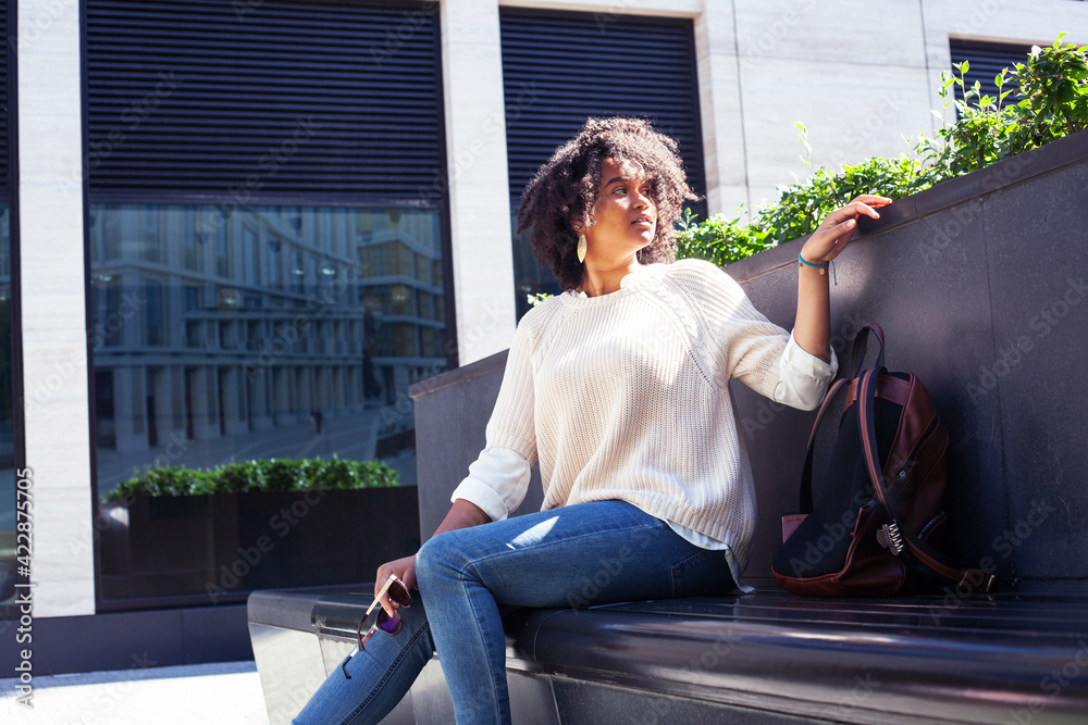 young pretty african girl posing cheerful on city background, lifestyle outdoor people concept young pretty african girl posing cheerful on city background, lifestyle outdoor people concept
