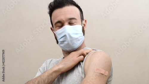 happy man vaccinated from coronavirus 