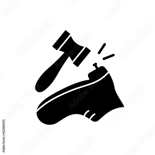 Shoe repair logo. Silhouette icon of shoemaker or cobbler. Black simple illustration of boot with nail and hammer. Flat isolated vector pictogram on white background