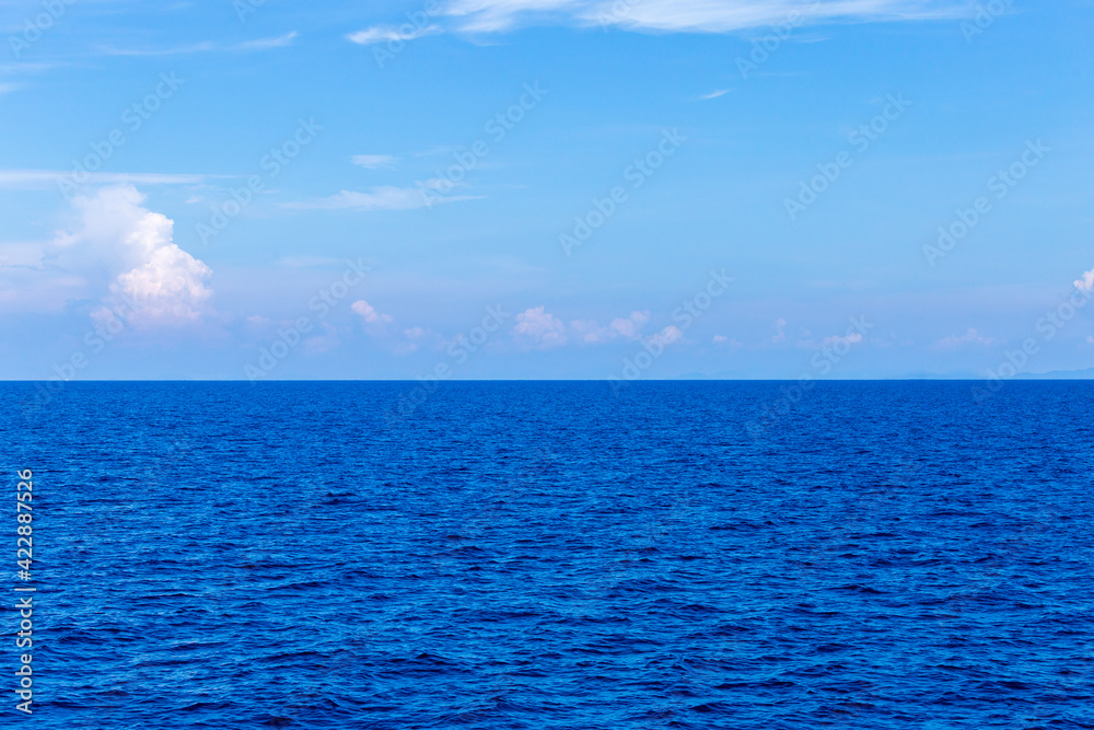 Fototapeta premium Blue Seawater with sea foam as background