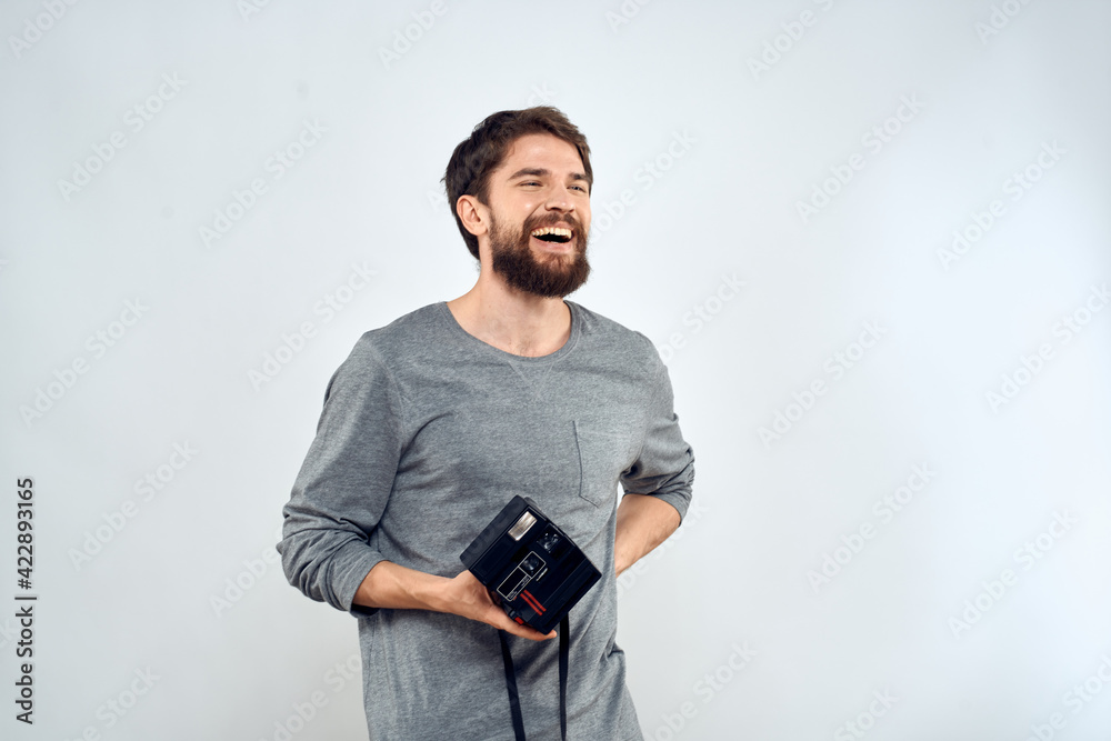 Male photographer holding a professional camera tasty technology hobby Male photographer holding a professional camera tasty technology hobby