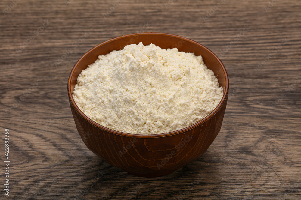 Wheat flour heap in the bowl