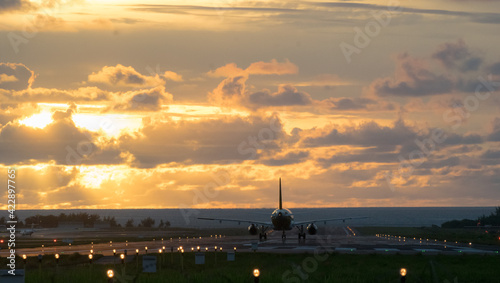 Airplane will take-off during sunset time 