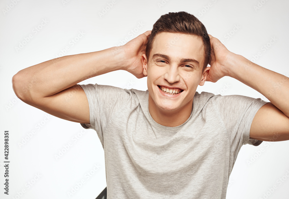handsome man studio light background model close-up handsome man studio light background model close-up