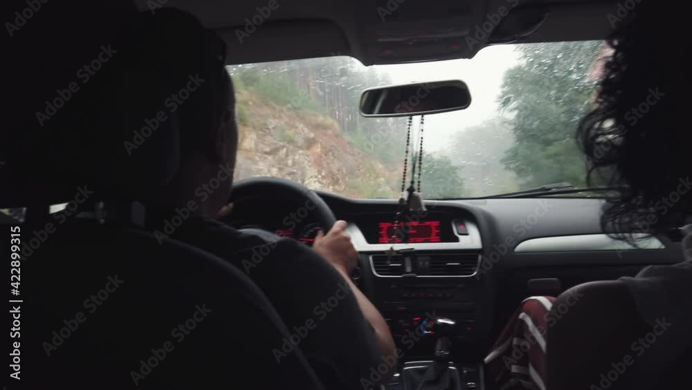 Drive car in rain storm on curve asphalt wet road. Drive car in rain storm on curve asphalt wet road.