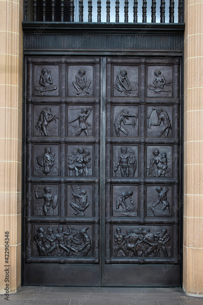 Bronze portico doors of the State library of NSW. The doors feature
