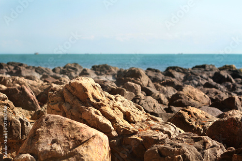 Beach rocks, The sun shines against the rocks on the beach.