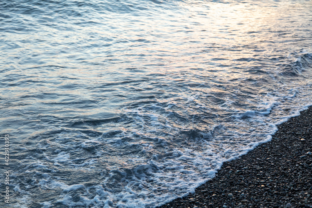 Water by the sea at sunset. Water by the sea at sunset.