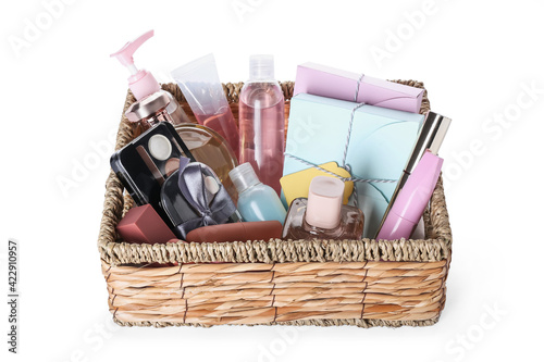 Gift basket with cosmetics on white background