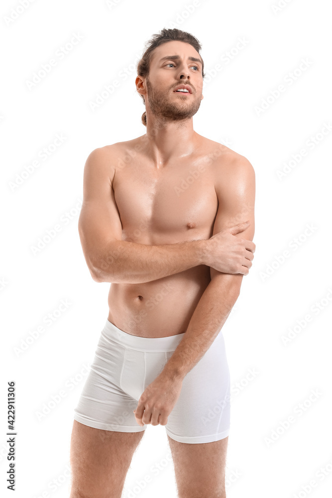 Fototapeta premium Sexy young man on white background