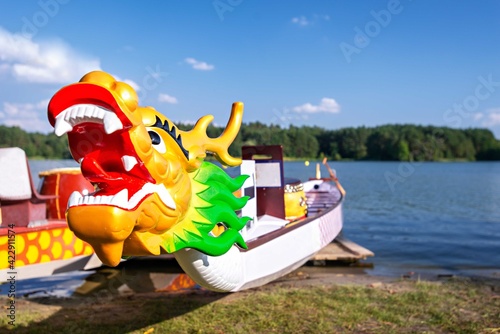 Dragon head on Dragon boat. Chinese dragon boat festival. Traditional Chinese paddled watercraft activity for over 2000 years