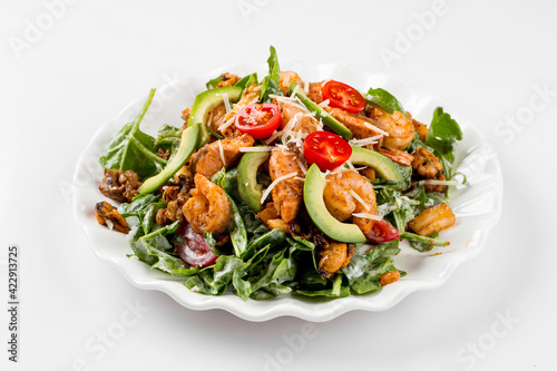 Isolated seafood and avocado salad on the white background