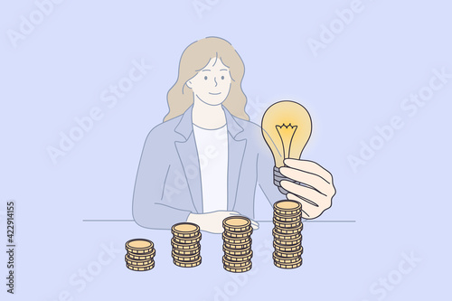 Saving energy and money concept. Young smiling Businesswoman cartoon character sitting at desk holding and putting lightbulb on coins stack on table for saving energy and money vector illustration 
