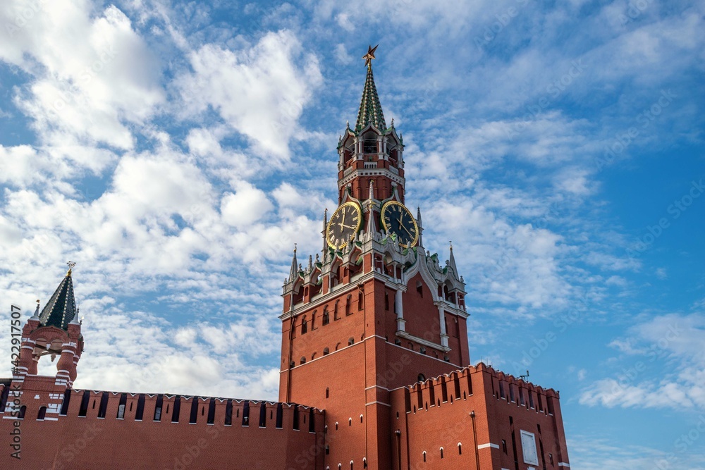 Spasskaya tower  with Kremlin chimes and walls of Kremlin in Moscow city in Russia on Red Square
