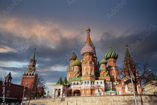St. Basil’s Cathedral and Spassky Tower on Red Square in Moscow. Orthodox church and architectural masterpieces of Moscow. Most famous sights of Russia. Life before pandemic COVID-19